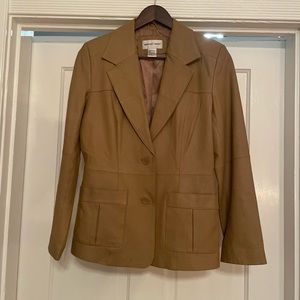 Beautiful 100% leather blazer. Excellent condition. 2 very minor flaws.